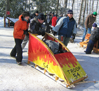 Pushing a sled at Klondike Derby, 2009