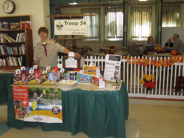 Troop 54 Scout selling popcorn at the 2012 Harvest Fair