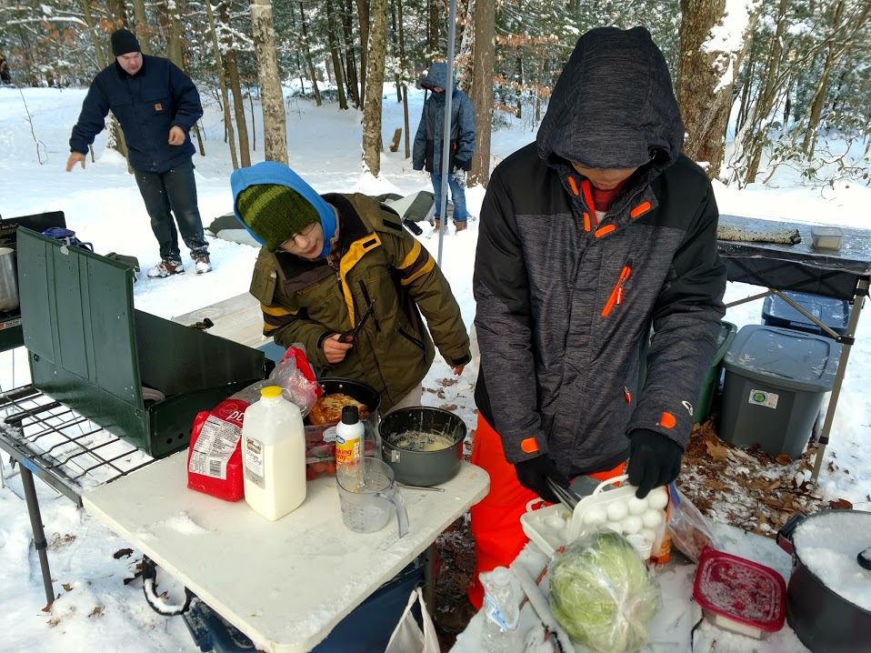 Troop 54 Boy Scouts prepare breakfast at Horace Moses Scout Reservation.