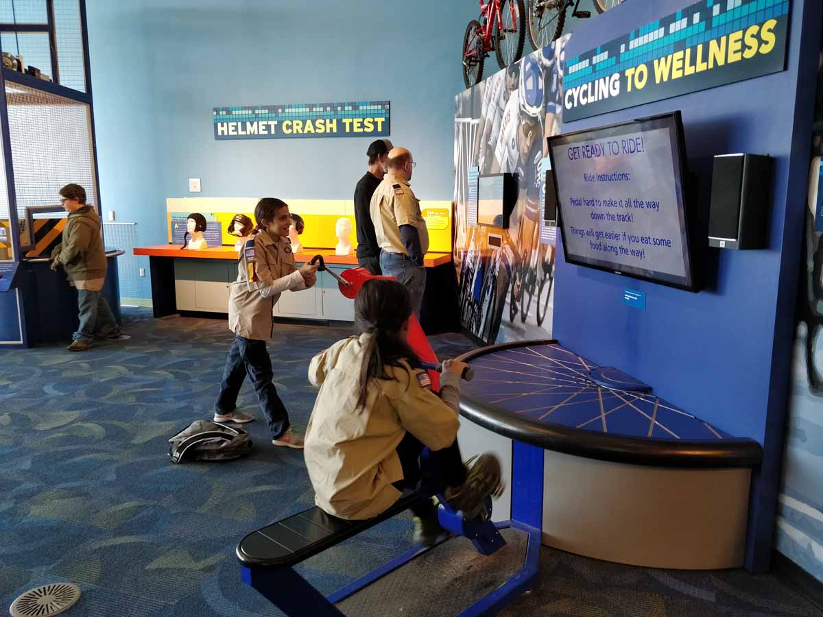 Scouts interact 
with exhibits at the Connecticut Science Center.